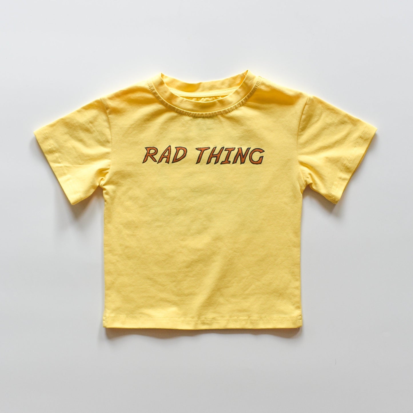 WHERE THE RAD THINGS ARE™ TEE - GOLDEN YELLOW