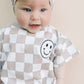 Short Sleeve Bubble Romper | Checkered Smiley Latte